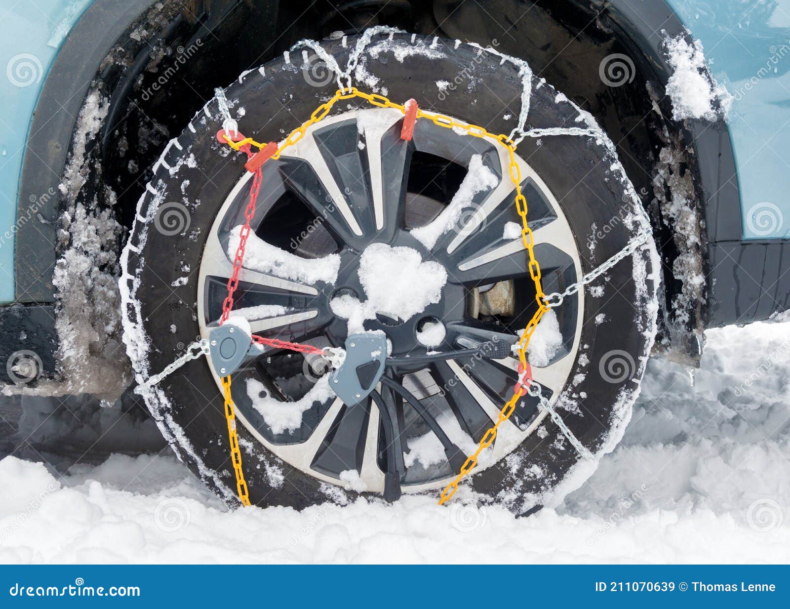 Snow Chains Fitted on a Car Wheel Stock Image Image of automobile