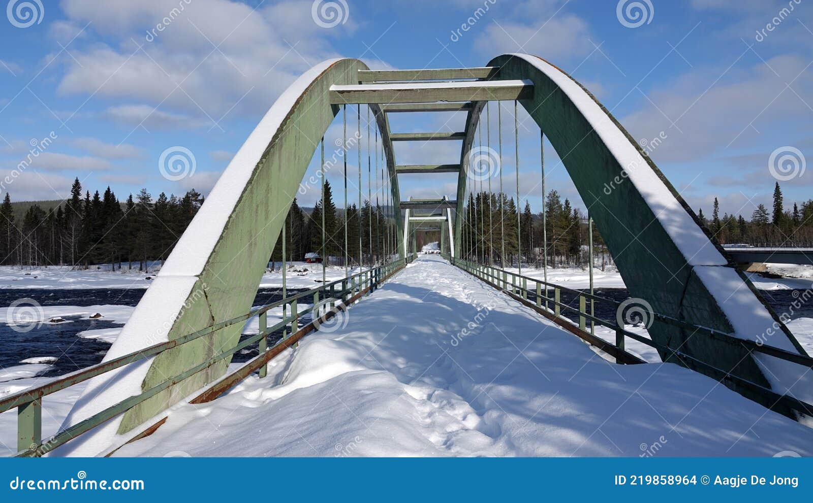 piteaalven river bridge at ljusselfoss in swedish lapland.