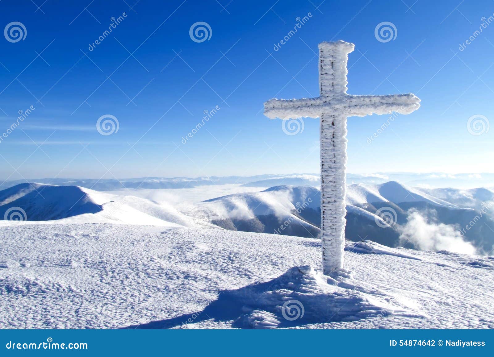 Snowcovered cross stock photo. Image of mountain, evening 54874642