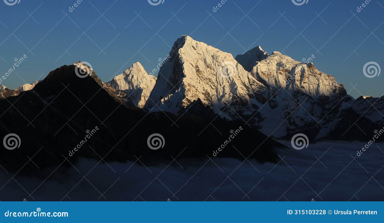 snow covered peaks of mt ama dablam, cholatse, taboche and tobuche