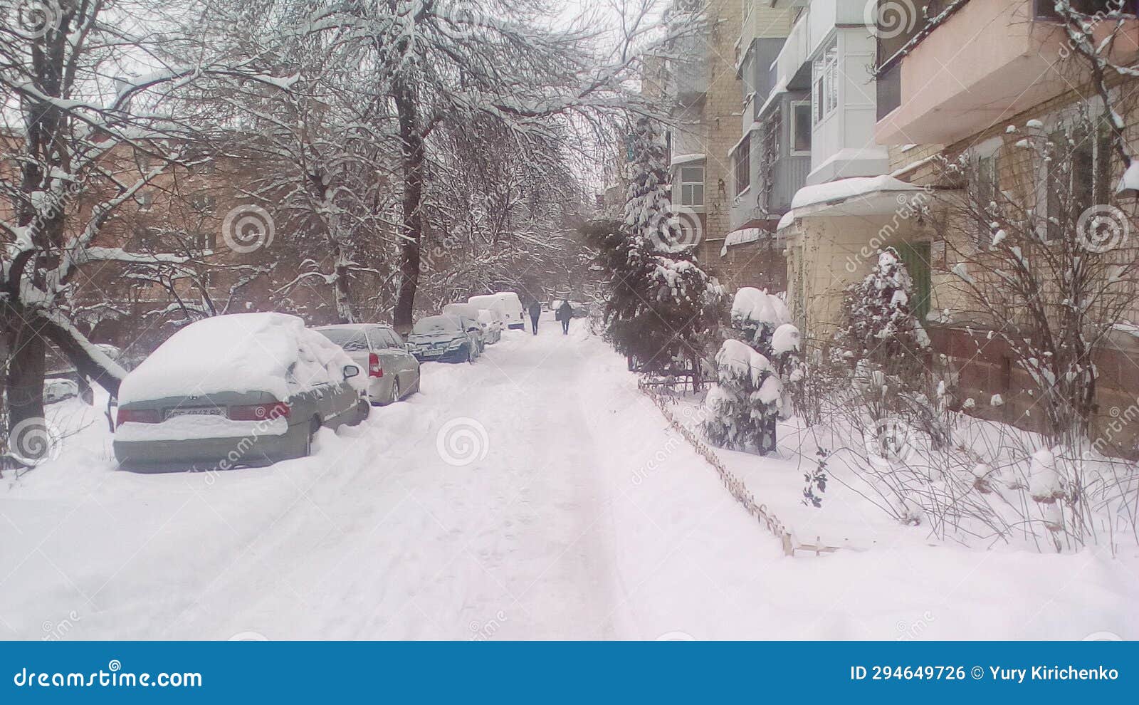 Snow Covered Road Opposite a Residential Building Stock Photo Image