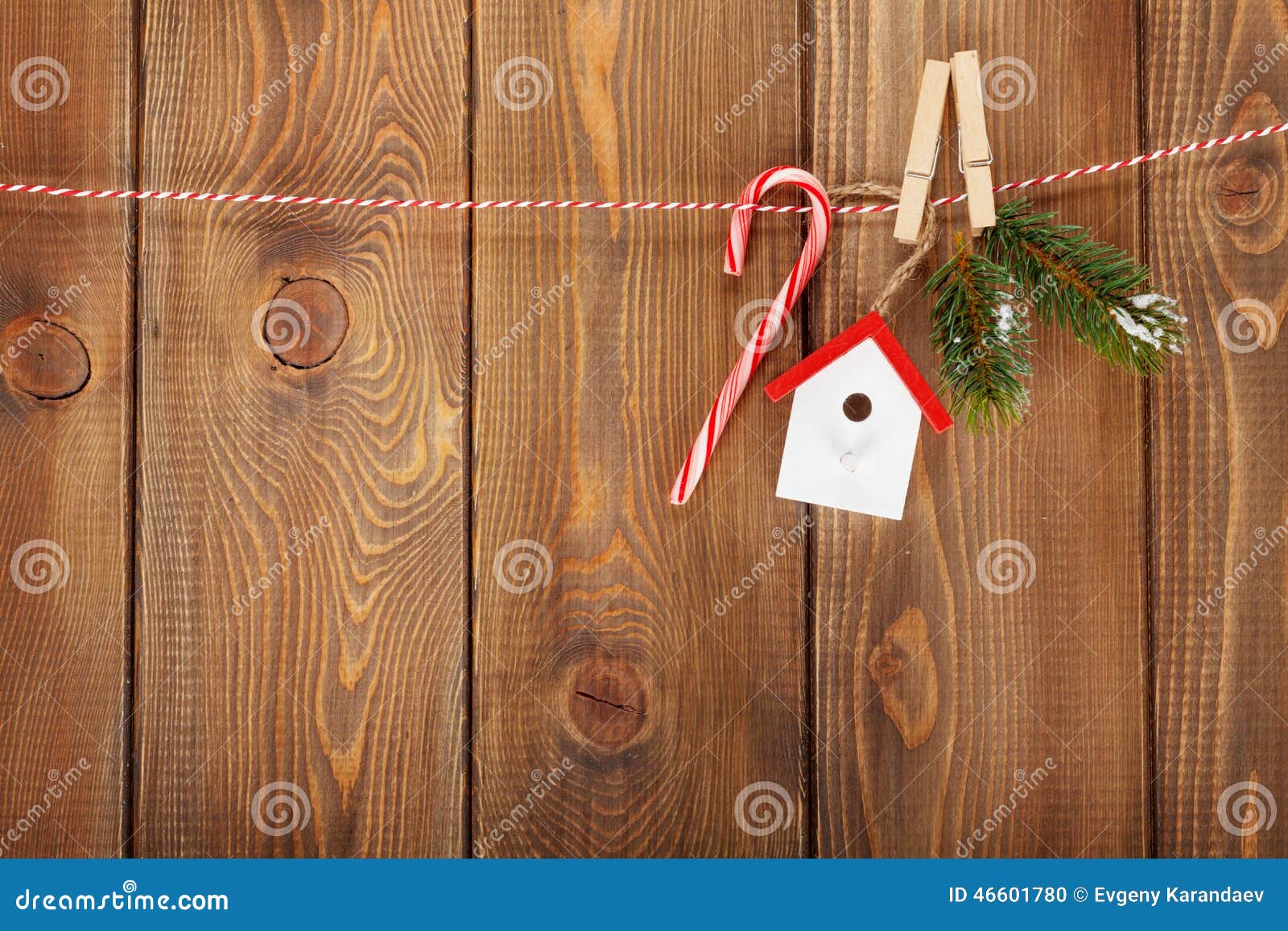 snow fir tree and christmas decor on rope