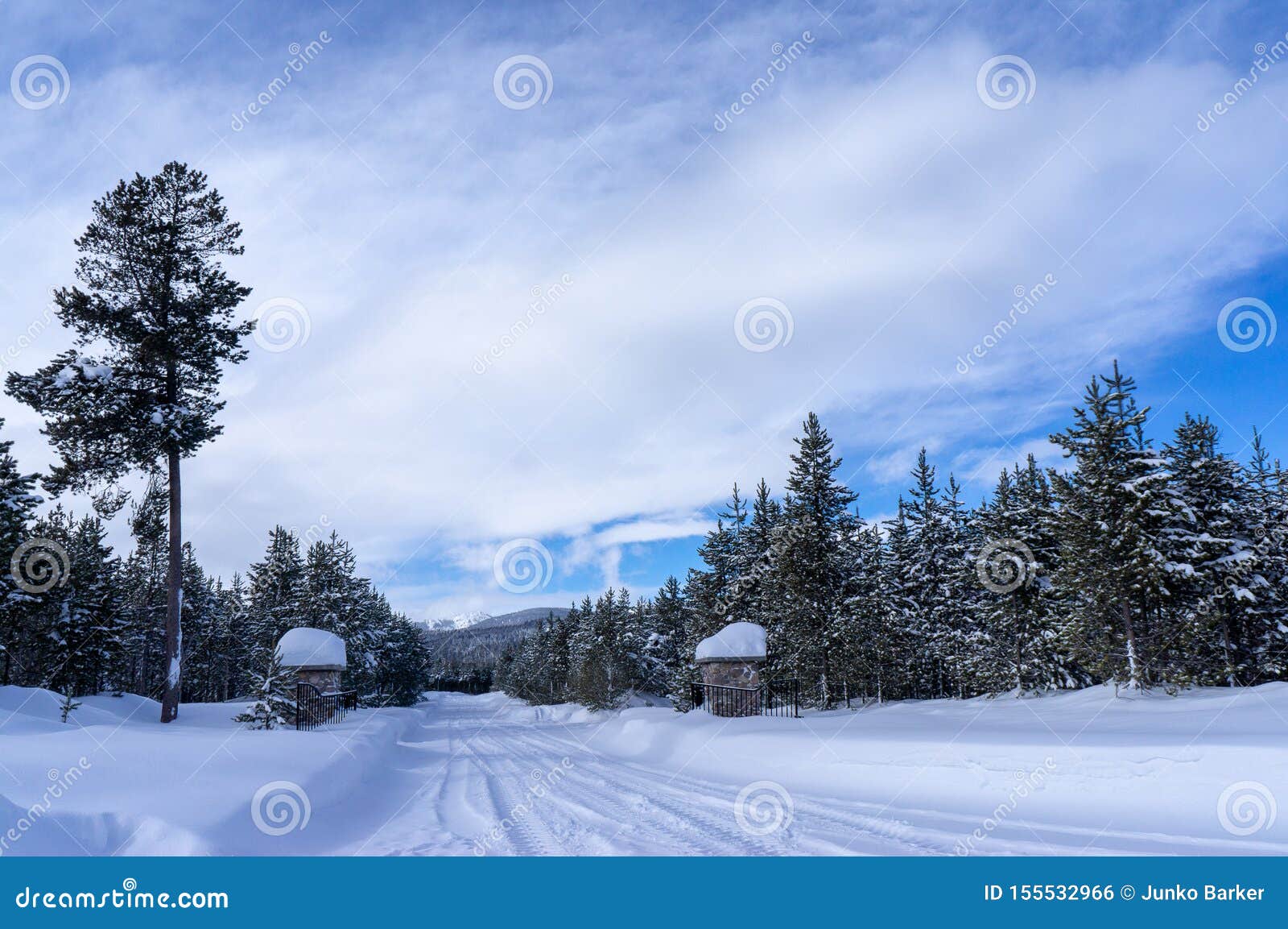Snow Packed Road at Island Park Idaho Stock Photo Image of mountains