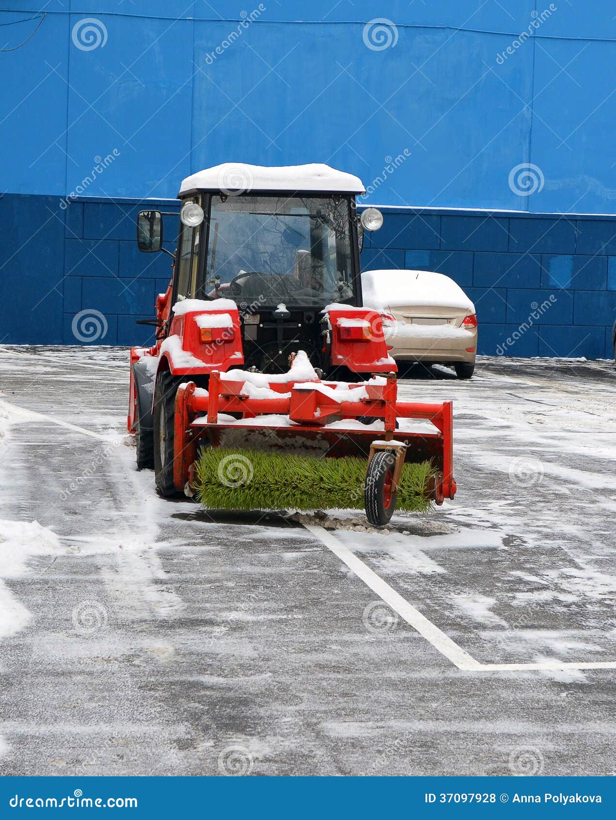 Empty not working snowblower on parking