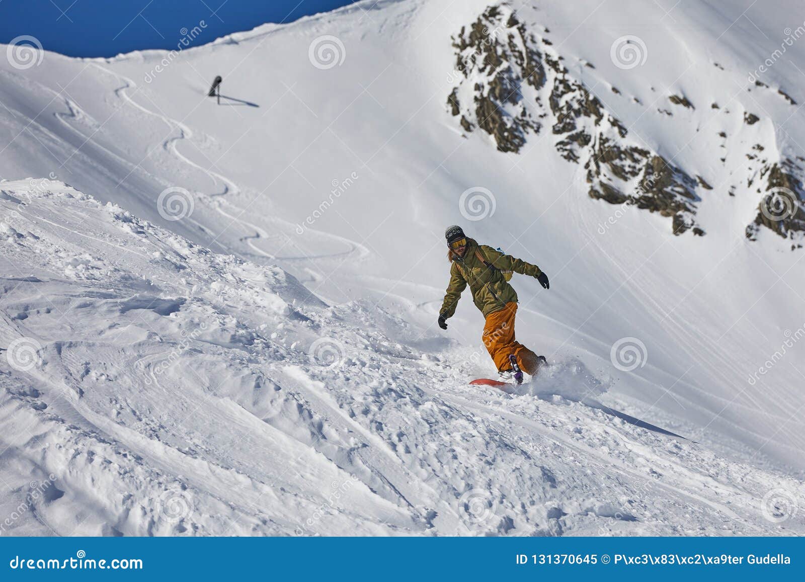 Snowboarder in the Alps editorial image. Image of descend - 131370645