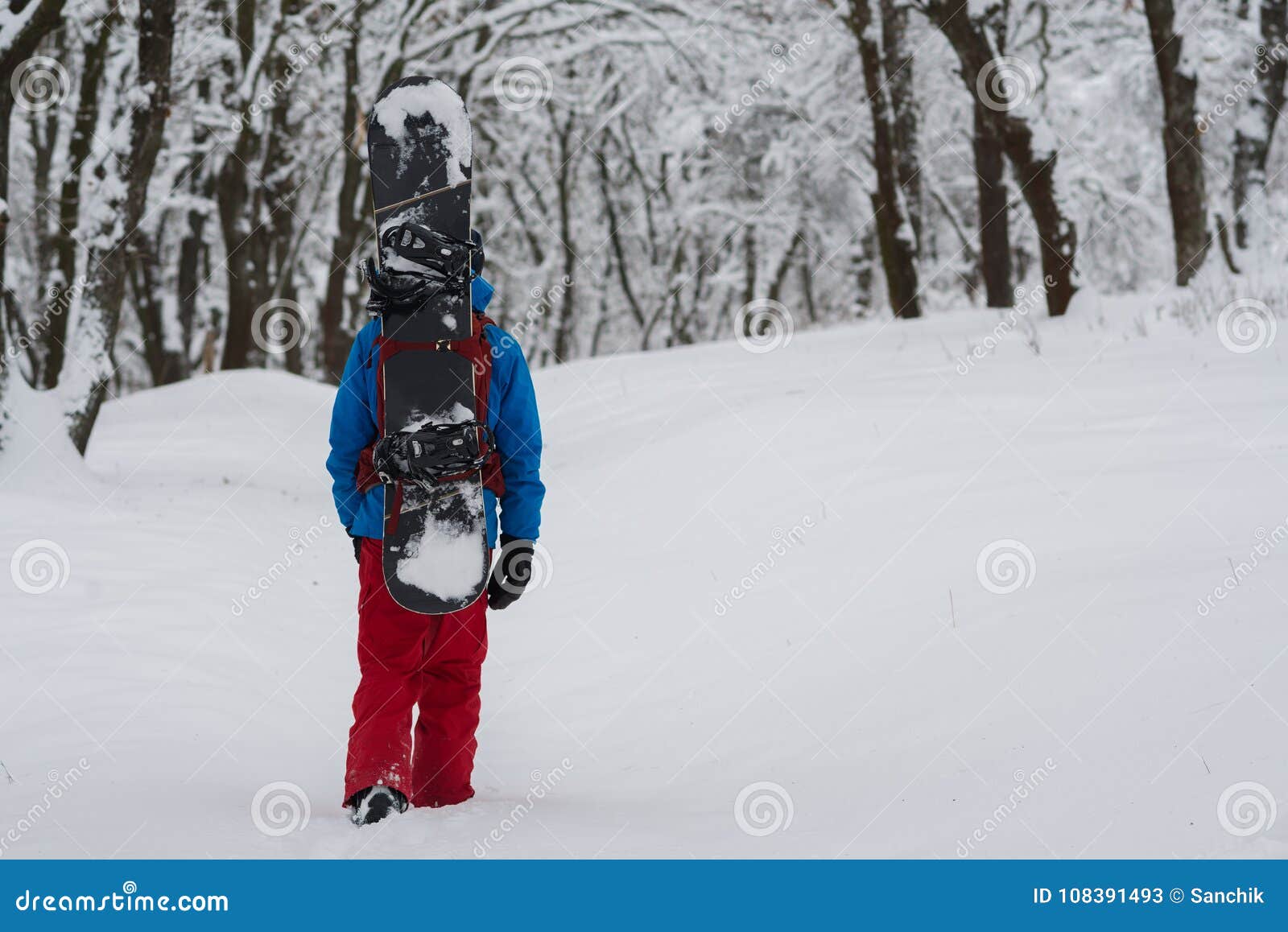 snowboarding with a backpack