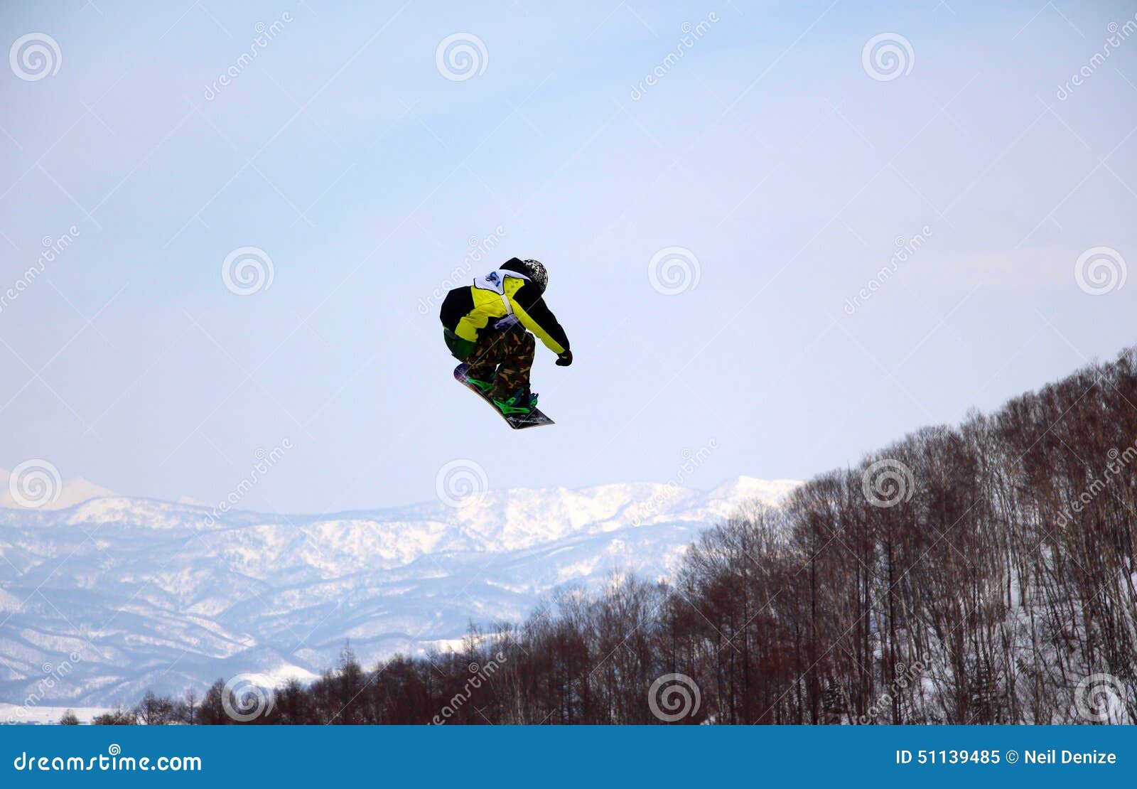 Snowboarder Going Off a Big Jump in Hanazono Park Editorial Image