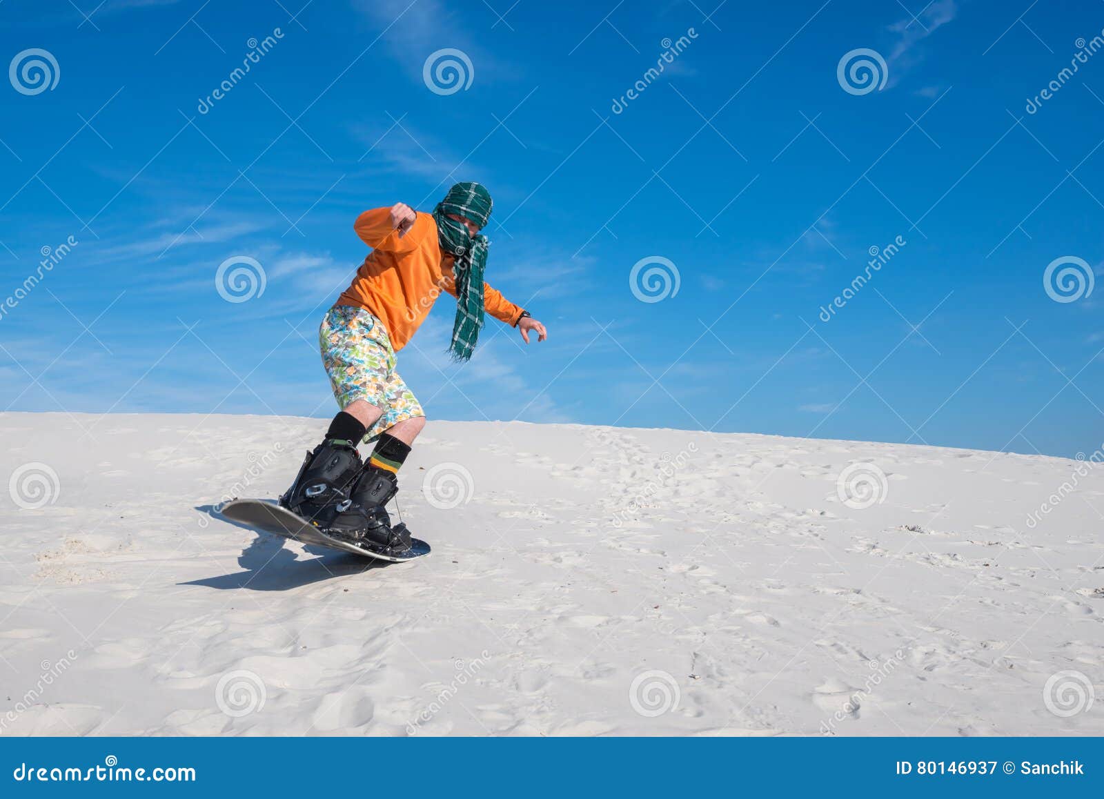 Snowboarder is Making a Trick on a Sand Dune. Wide Angle Stock Image ...