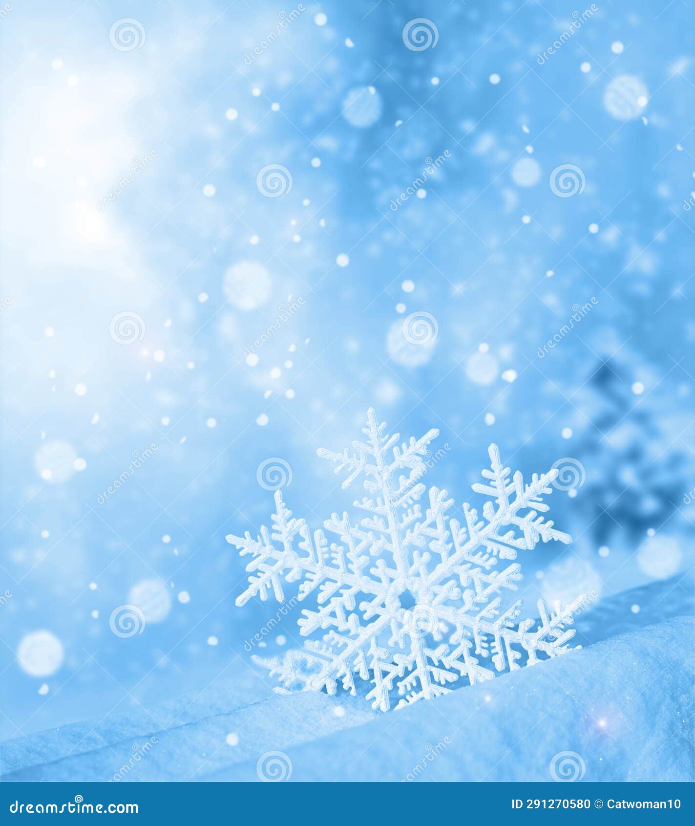 snowflake d bokeh. combined with blue background. winter concept