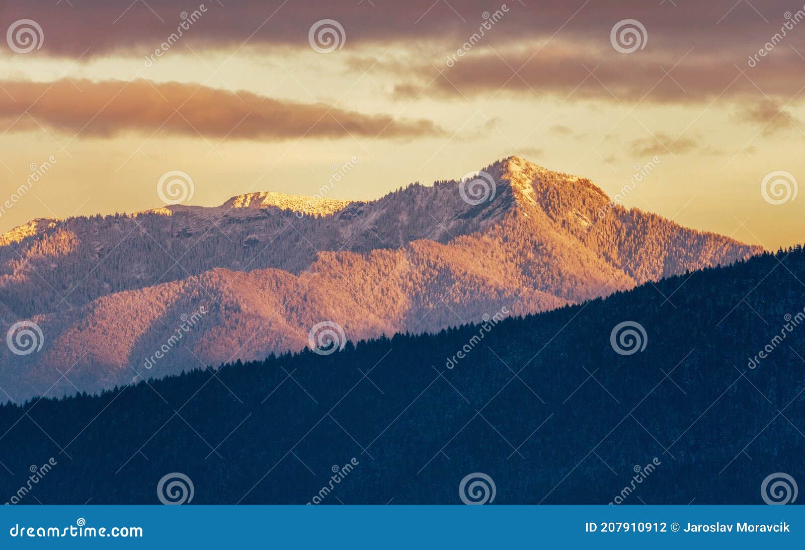 showy hill and colorful evening sky