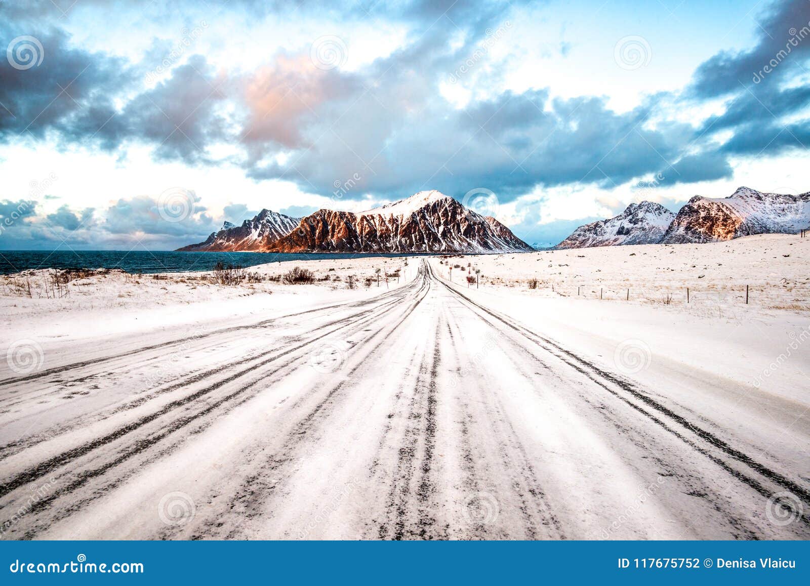 snowy road leading to the skagsanden mountain