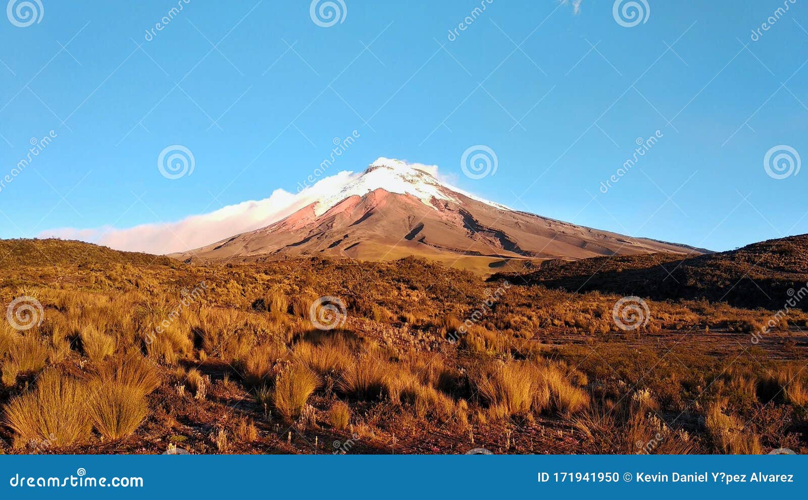 snowy volcano sunset with blue sky