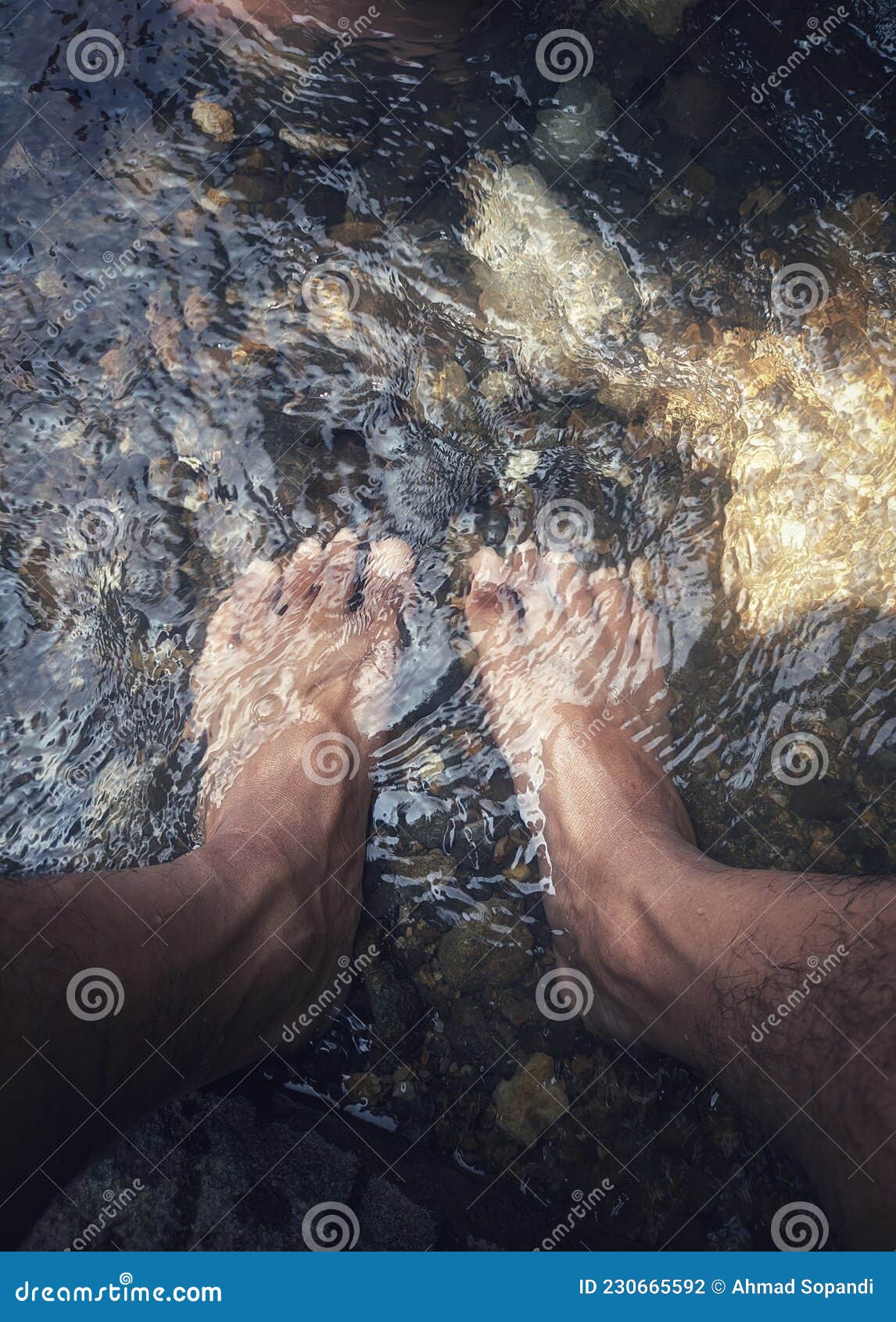 Soak feet in hot water stock photo. Image of portrait 230665592