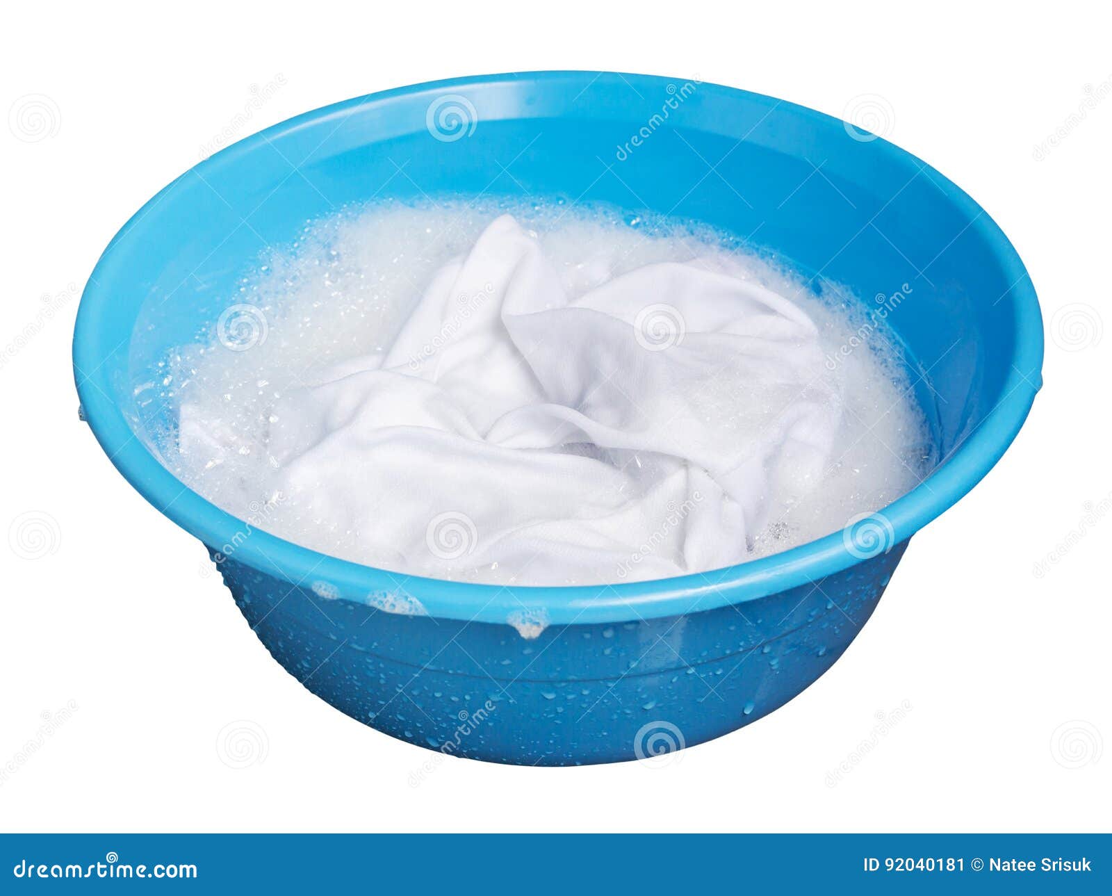 soak whites clothes in the enameled bowl on white background