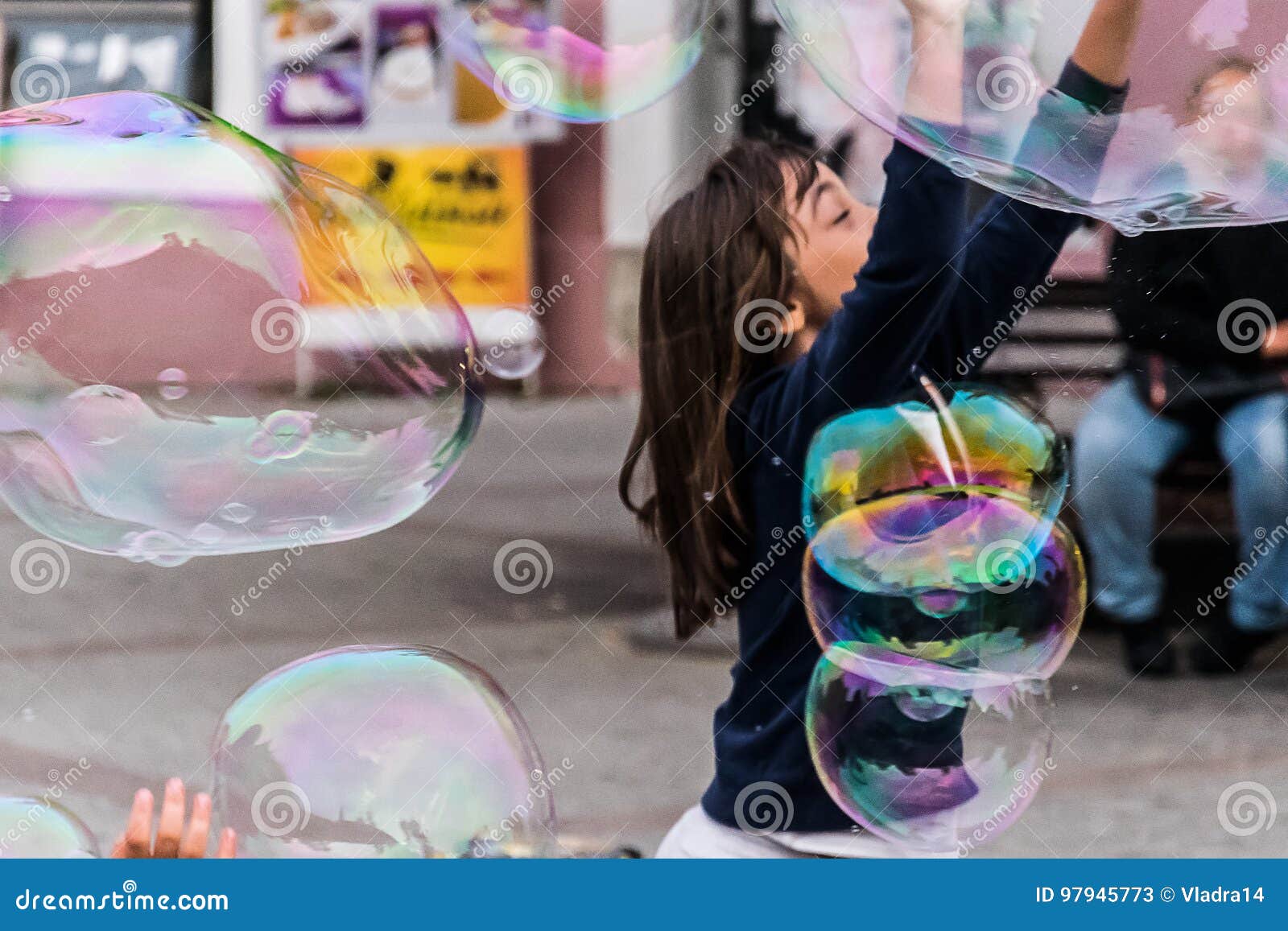 Soap bubbles and girl stock image. Image of crowd, looking - 97945773