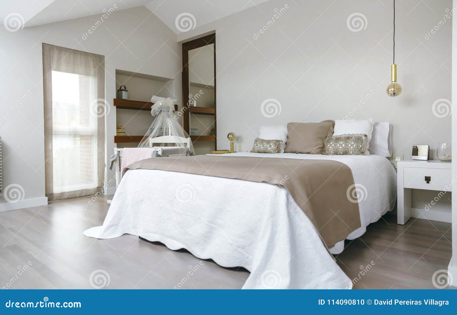 Bedroom with Double Bed and Cot Stock Photo Image of light, bedside