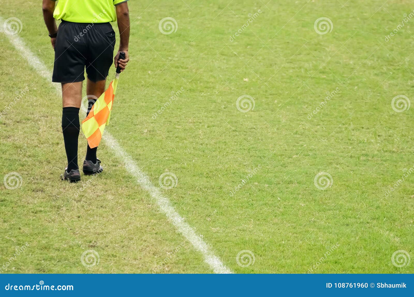 Soccer assistant referee stock photo. Image of grass 108761960