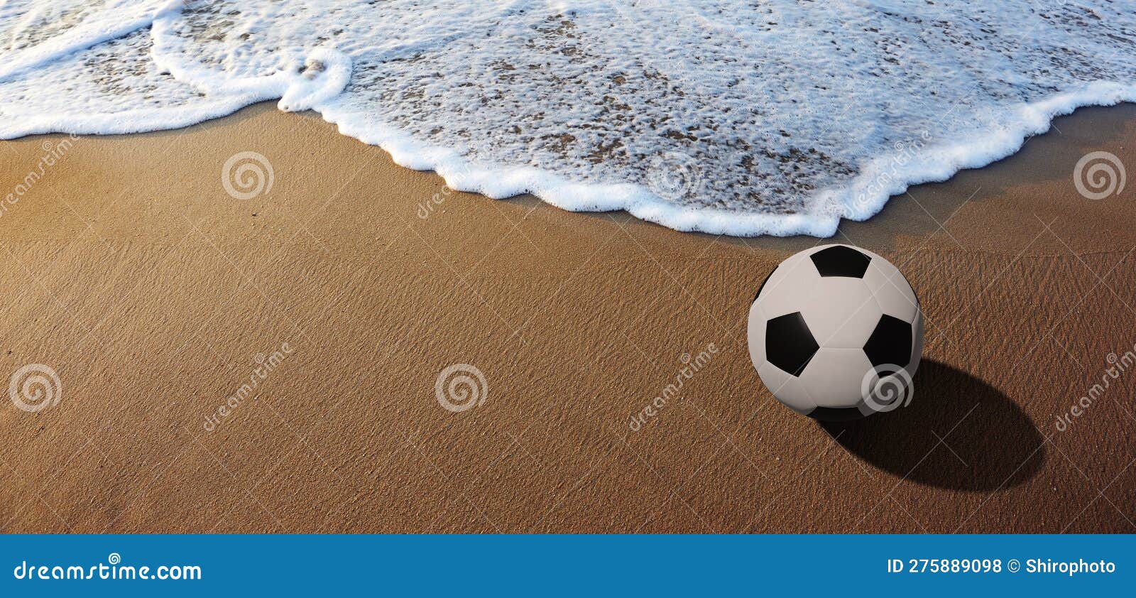 Soccer ball on the beach stock photo. Image of sand 275889098