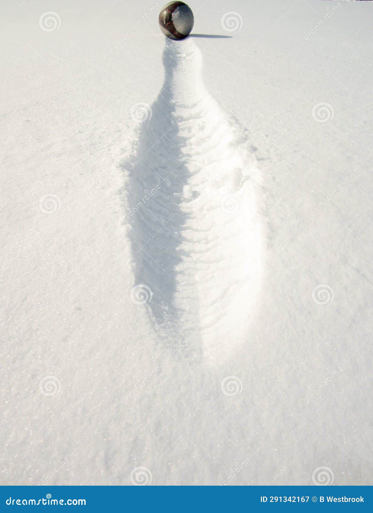 Soccer Ball Rolling in Fresh Snow Stock Image Image of untouched