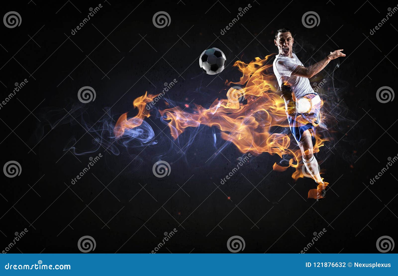 Game hottest moments. Soccer player in fire flames kicking ball