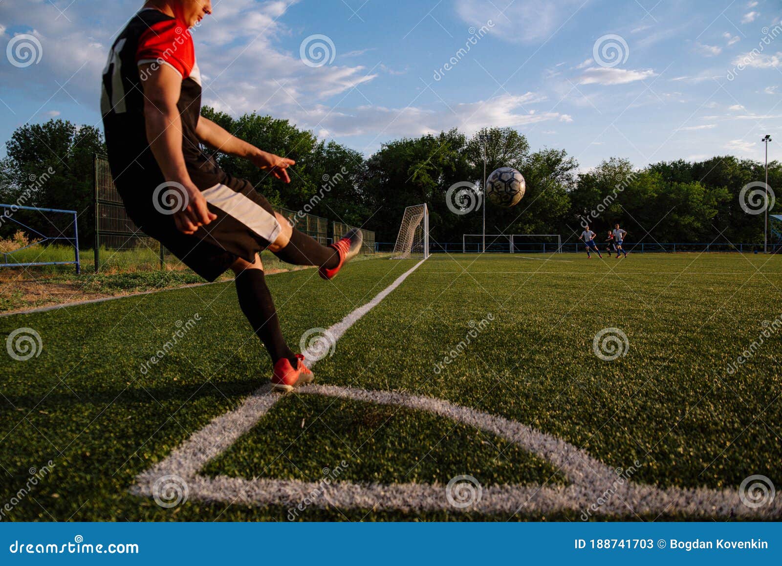Soccer Player Kicks the Ball.Soccer Player Takes a Corner Kick Stock