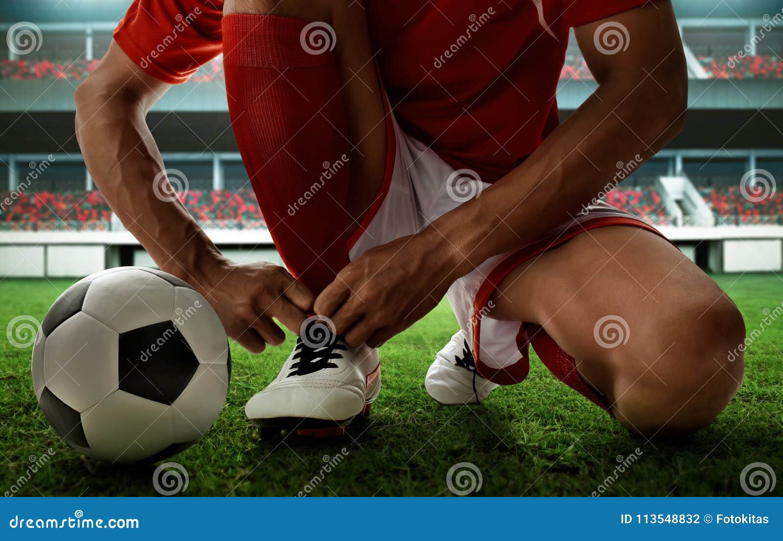 Soccer Player Tying Shoes on the Field Stock Photo Image of kick