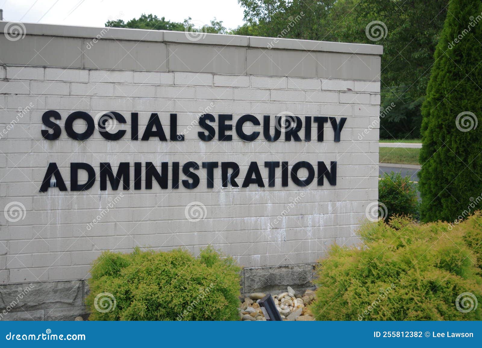 Social Security Administration Sign on White Brick Stock Photo Image