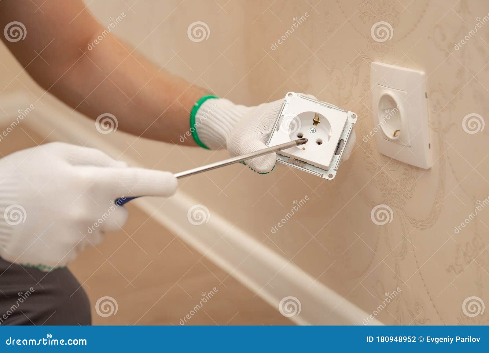 Sockets Outlet Install Electrician Man Builder Working at Home Stock