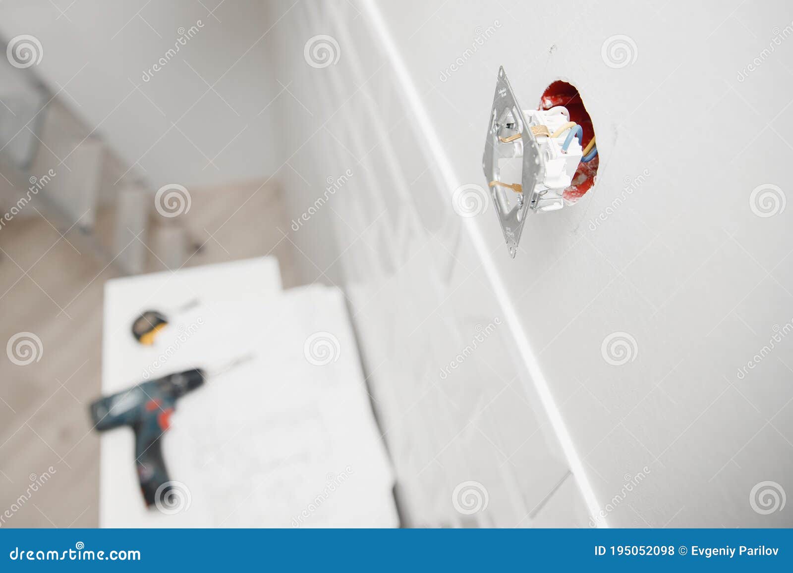 Sockets Outlet Install Electrician Man Builder Working at Home Stock