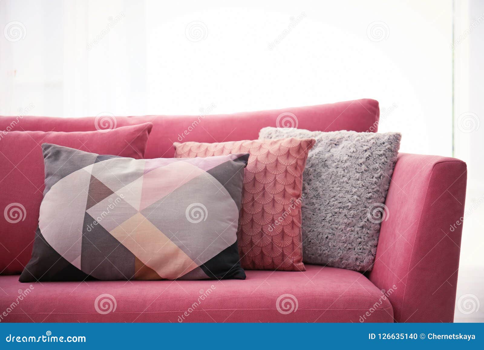 Sofa with colorful pillows stock photo. Image of couch 126635140