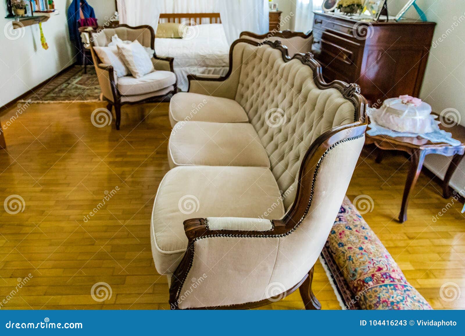Sofa in cozy bedroom stock image. Image of armchair 104416243
