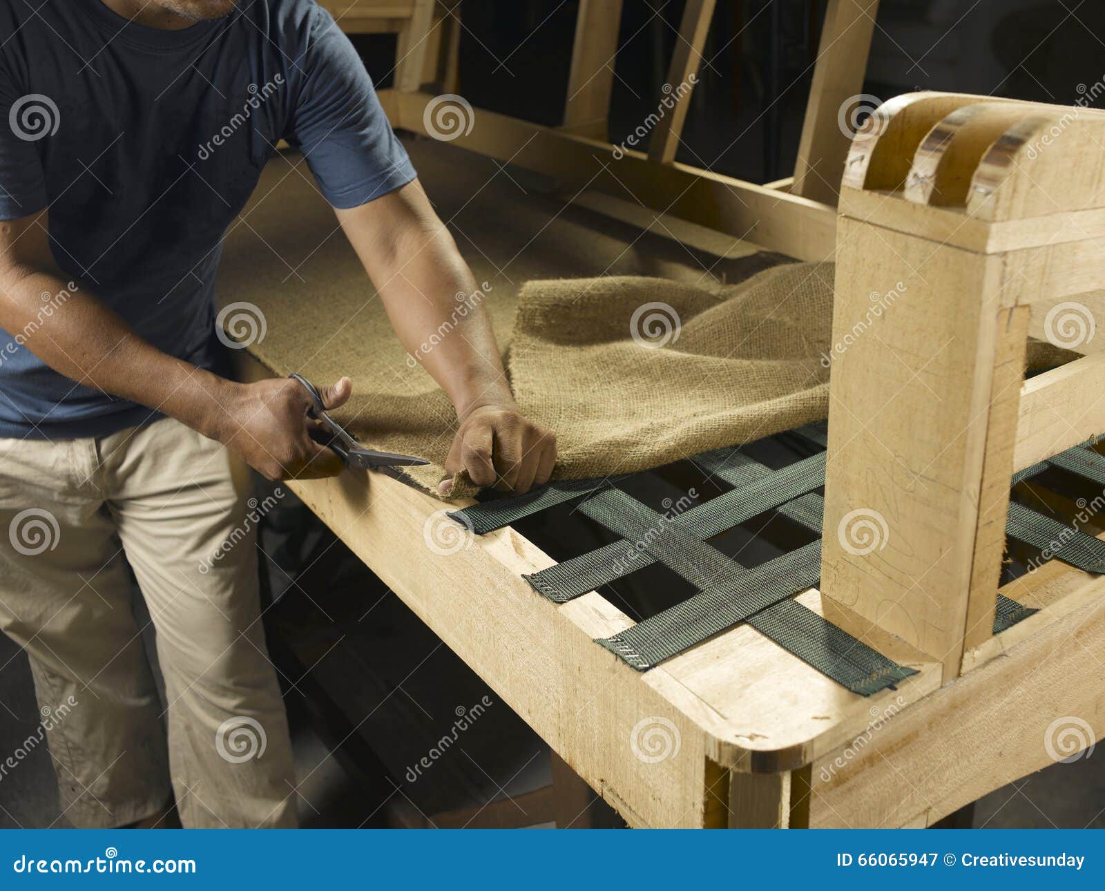 Detailed Charles Keasing the purpose Sofa manufacturing stock image. Image of scissors, worker - 66065947