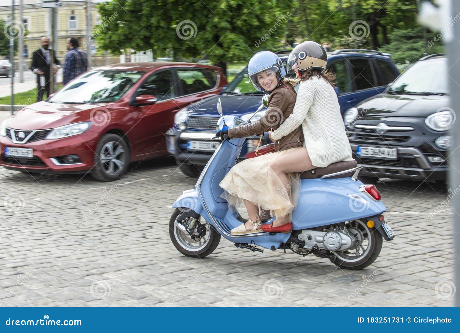 girl riding scooty