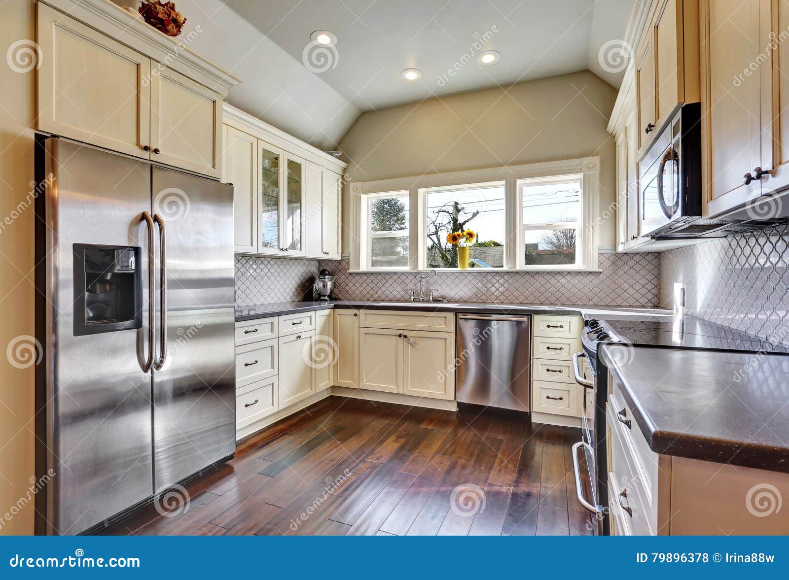 Soft Beige Kitchen Cabinets In A Kitchen Room Stock Photo Image