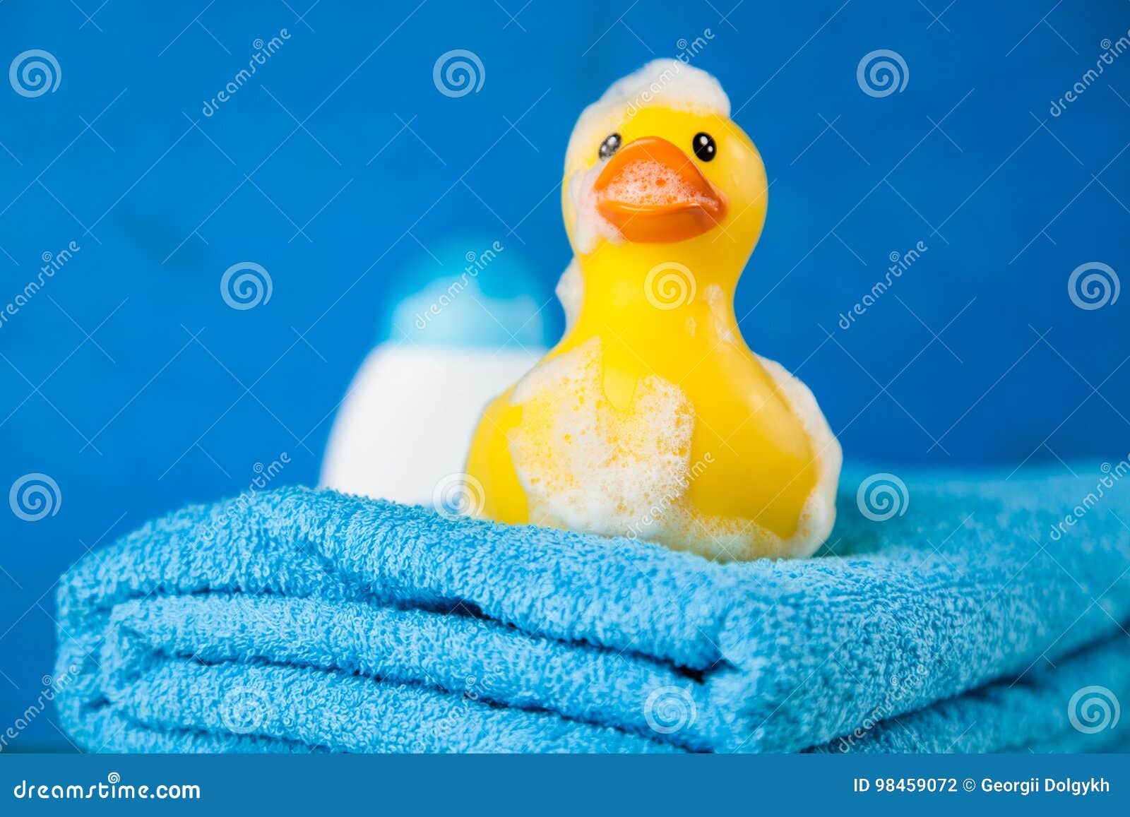 Soft Blue Towels and a Toy Duck Stock Photo Image of color, baby