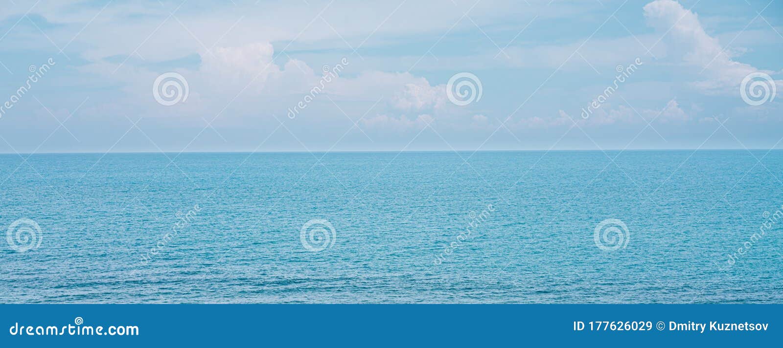 soft blue waveless indian ocean extending all the way to horizon