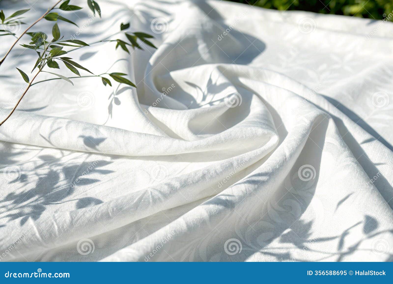 leaf shadow on white fabric