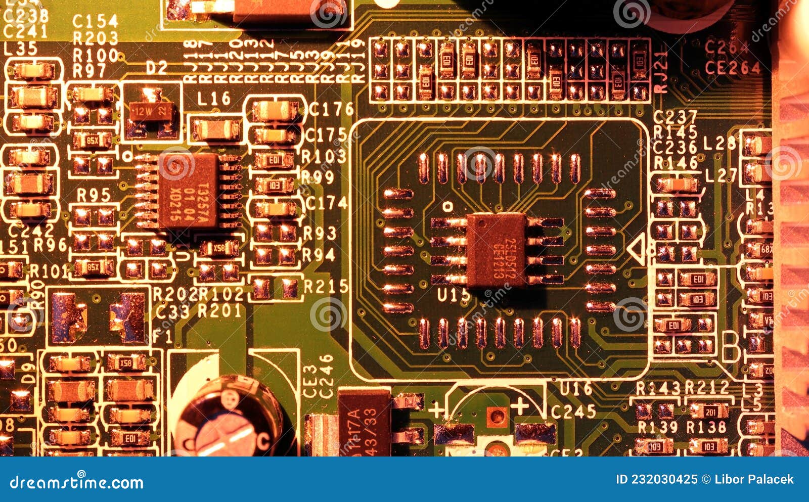 soft focus. concept of micro chips in red backlight. detail of microchips on an electronic circuit board.