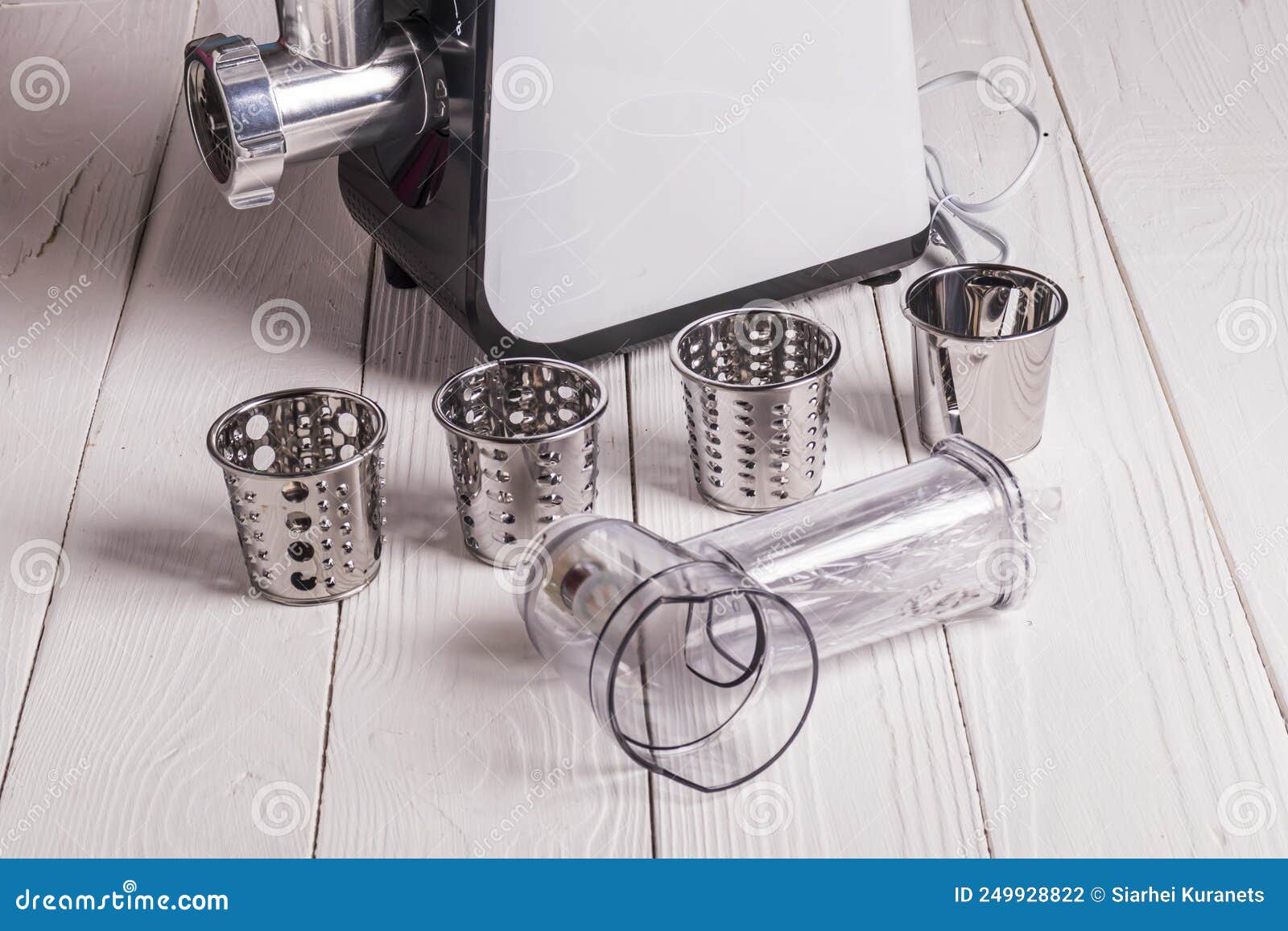 Soft Focus. Electric Meat Grinder Its Components Lie Side by Side Stock