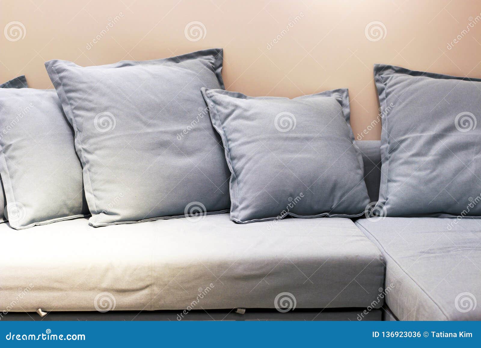 Soft Gray Pillows on the Couch Front View, Closeup Stock Photo Image