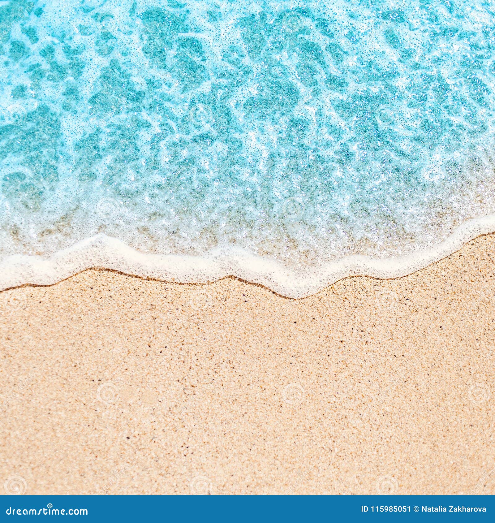 Soft Wave of Blue Ocean on Sandy Beach with Copy Space Fr Text. Stock