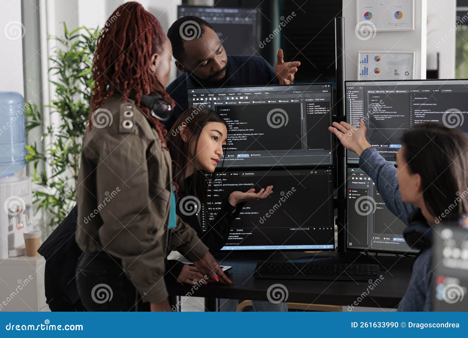 Software Programmers Analyzing Html Code and Database Stock Photo