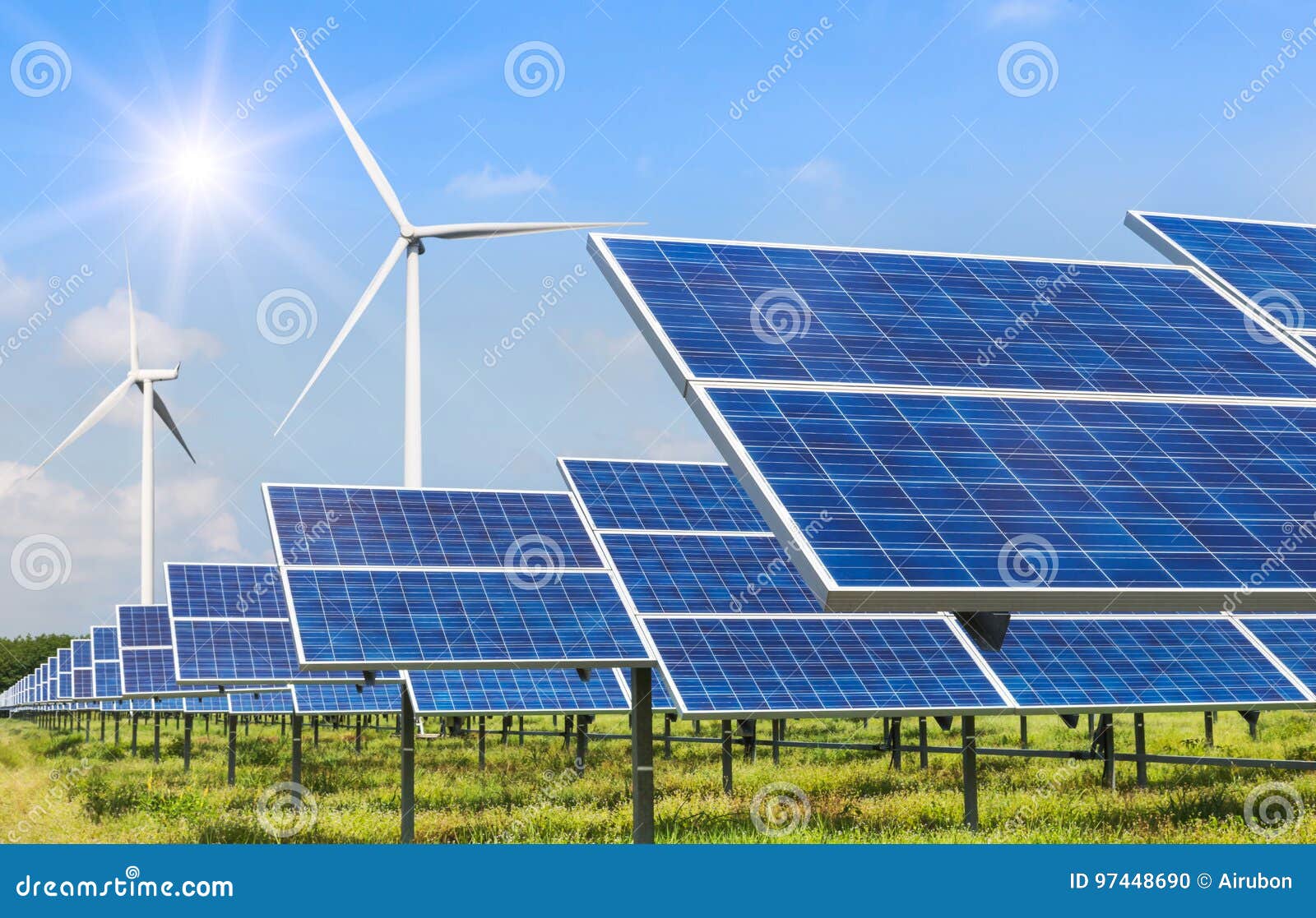 solar cells and wind turbines generating electricity in power station alternative renewable energy