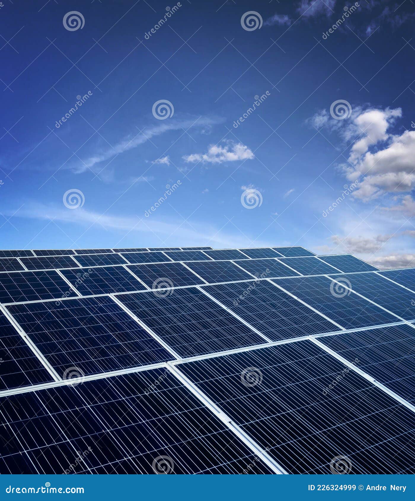 Solar Energy Power Plant Over a Beautiful Cloudy Sky Stock Image