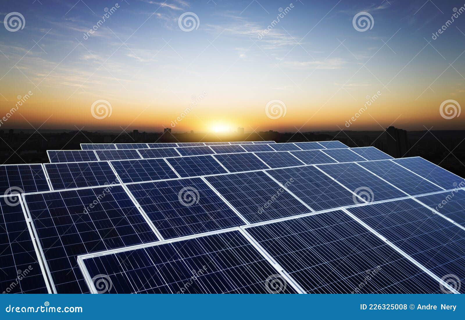 Solar Energy Power Plant Over a Beautiful Cloudy Sky Stock Photo