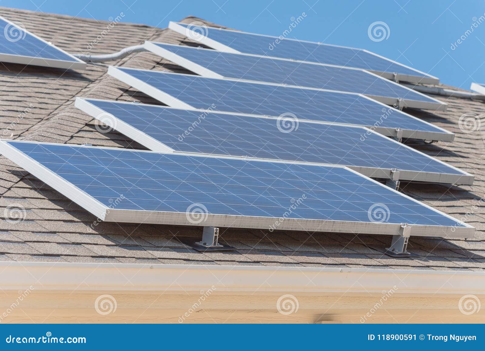 Solar Panel Installation on Asphalt Shingles Rooftop Stock Image