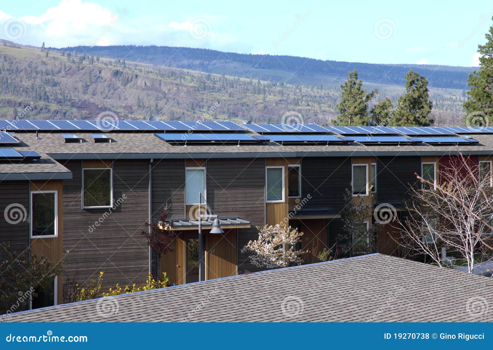 Solar Panels on Condominiums. Stock Photo Image of condominiums