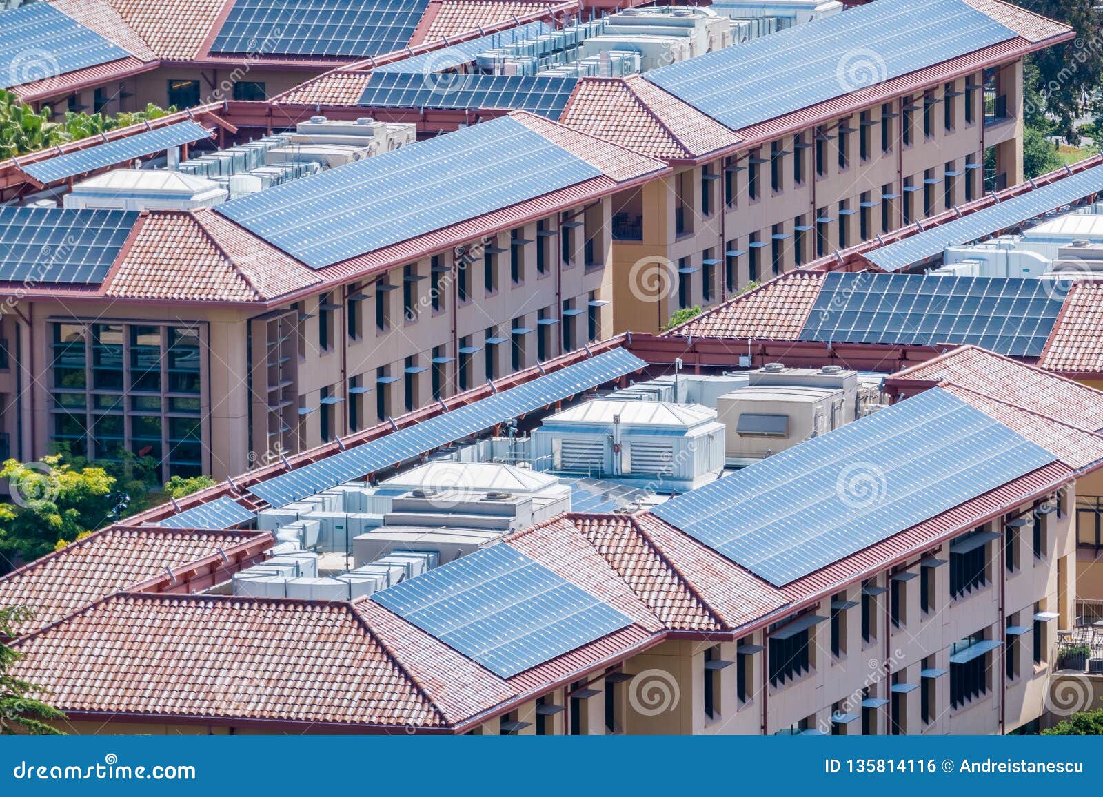 Solar Panels Installed on the Tiled Rooftops of Buildings, San