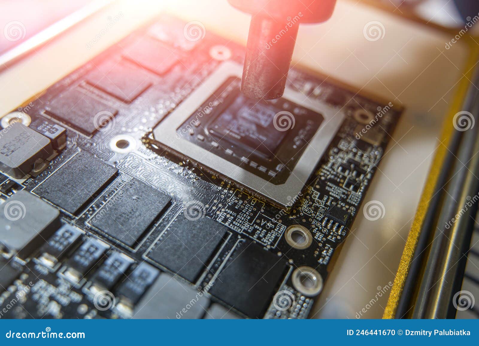Soldering of Electronic Components of the Motherboard Stock Photo