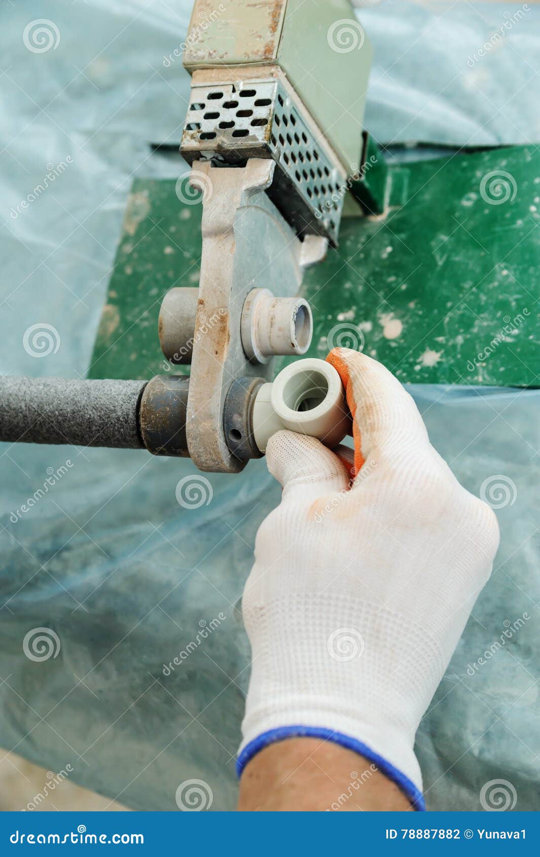 Soldering plastic pipe. stock photo. Image of worker 78887882